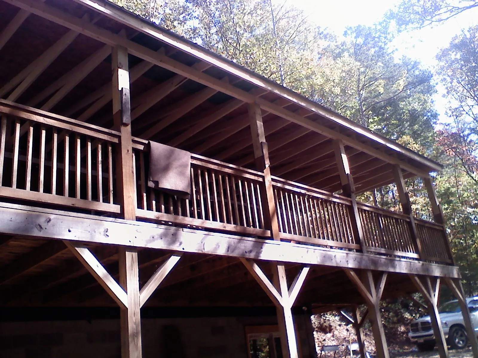 Timber framing under a new elevated porch and deck — Roof Leak Repair in Central Village by Roofing Brothers